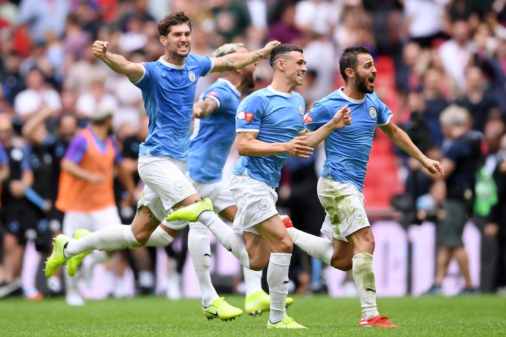 Man City beat Liverpool 2-1 in a dramatic ending to push for title